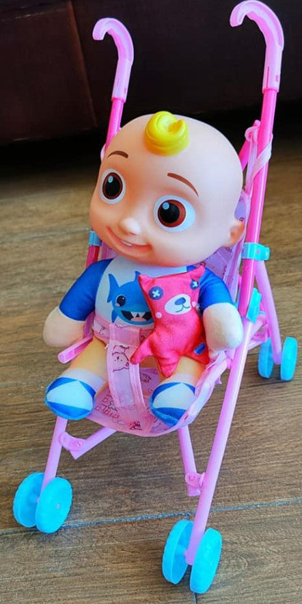 POUPÉE COCOMELON ET POUSSETTE
