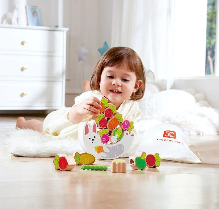 WOODEN RABBIT STACKING AND THREADING GAME